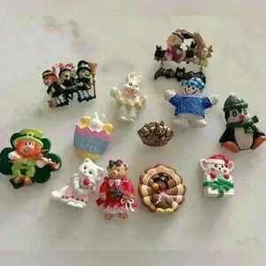 Set of 12 vintage plastic various holiday brooches some singed Hallmark and Russ